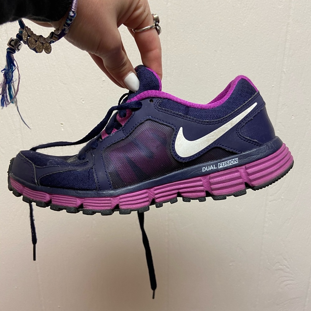 Blue and purple Nike running shoes